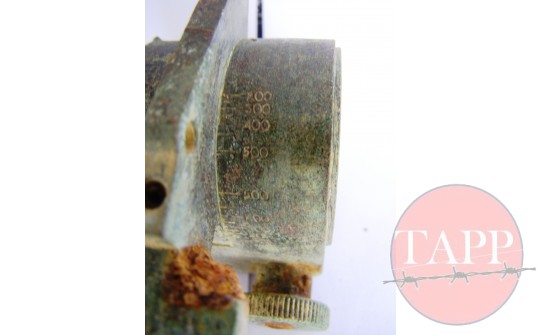 Close up of mortar sight showing graticules