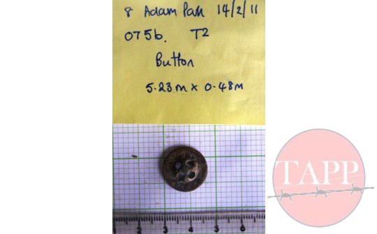 Shirt button inscribed with word 'Birmingham'