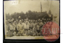 Thrale and the survivors of the Adam Road Camp pose in front of flagpole reputedly at Adam Park