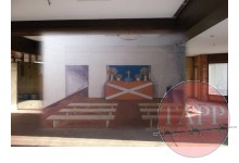 Composite showing the sketch laid over the modern photo
