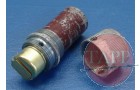 A pristine version of the fuze cap and fuze