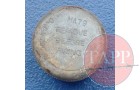A pristine version of the fuze cap and fuze