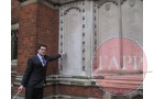 Pointing out Frank's name on the memorial