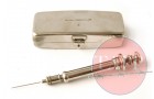 A pristine example of a similar item as part of a syringe kit
