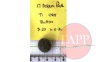 A uniform button found at No17 Adam Park